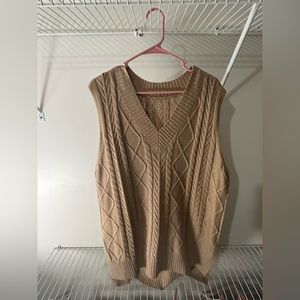 Very nice cream vest.